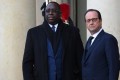 Le président Macky Sall aux côtés de François Hollande le 11 janvier dernier avant la marche républicaine, à Paris.
AFP PHOTO / DOMINIQUE FAGET