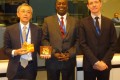 Monsieur Aly TOURE entouré du Directeur Exécutif sortant,Mr Kitahara et du Nouveau Directeur Monsieur Arnaud Petit