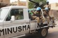 UN peacekeepers from Burkina Faso patrol on election day in Timbuktu July 28, 2013. REUTERS/Joe Penney (MALI - Tags: ELECTIONS POLITICS MILITARY) - RTX1233B