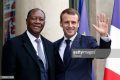 PARIS, FRANCE - NOVEMBER 12:  French President Emmanuel Macron (R) welcomes Ivory Coast's President Alassane Ouattara prior to their meeting at the Elysee Presidential Palace on November 12, 2018 in Paris, France. Ouattara came to France to participate in the international ceremony of the Armistice Centenary of 1918 at the Arc de Triomphe on November 11.  (Photo by Chesnot/Getty Images)