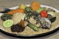 Le thieboudieune, une recette sénégalaise, autrement appellée riz au poisson.